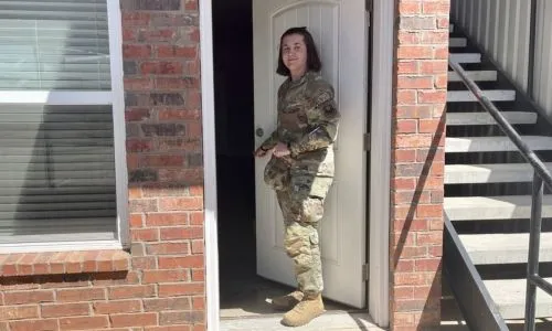 Service Woman walking through front door