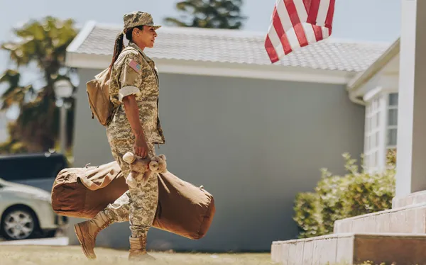 Service woman returning home